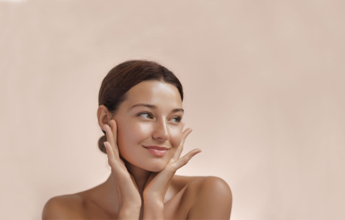 woman-blush-BG-touching-face-S